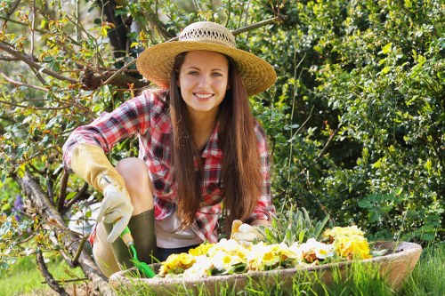 Patio, planting, and hard landscaping features in a Chigwell garden